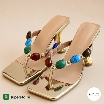 Women's mules heels in shiny gold with multicolored stone accents