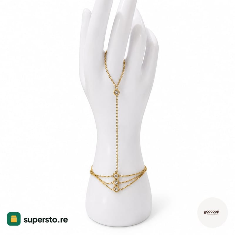 Hand chain in gold tone
