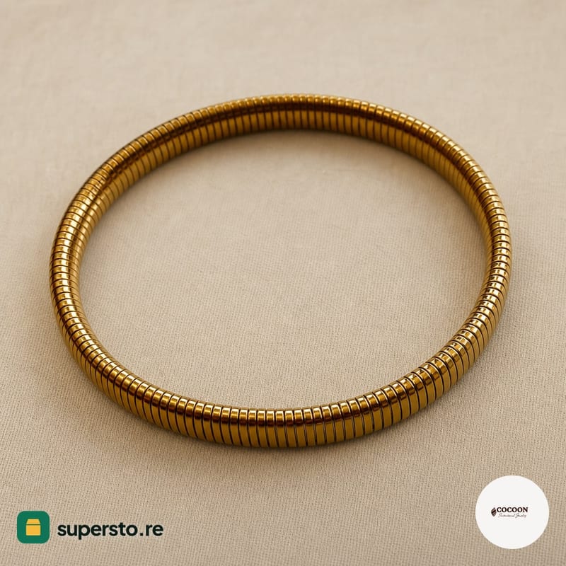 Bangle coil bracelet gold-tone segmented metal slip-on
